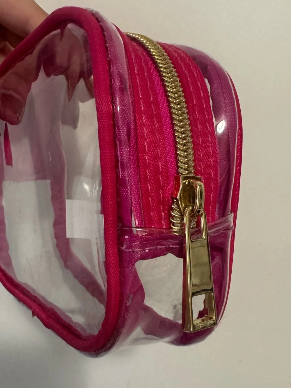 Small clear hot pink cosmetic bag